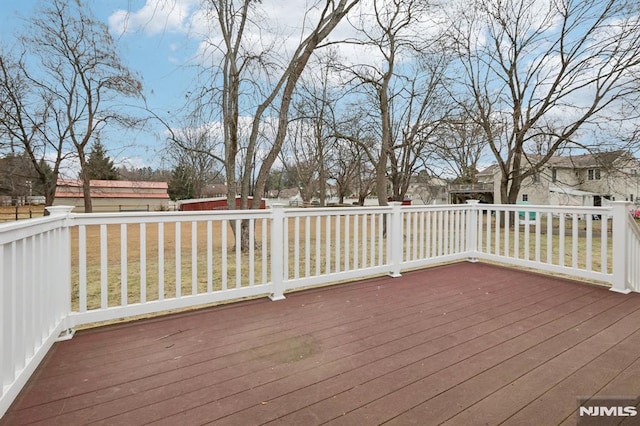 deck featuring a yard