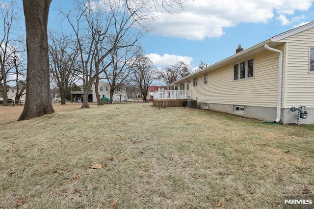 view of yard with central air condition unit