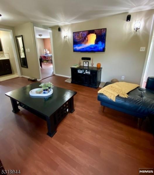 living room with hardwood / wood-style floors