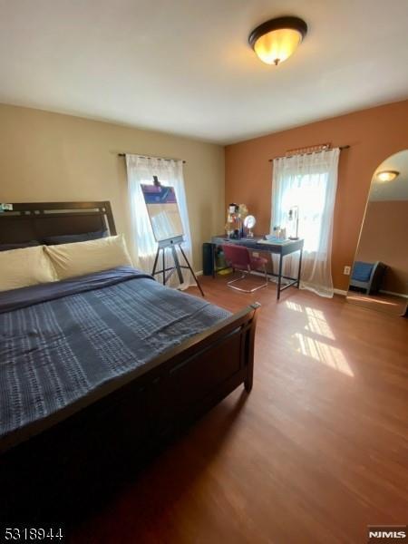 bedroom featuring hardwood / wood-style flooring