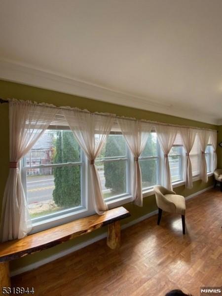 unfurnished room featuring hardwood / wood-style flooring