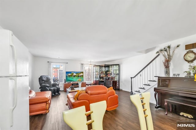 living room featuring dark wood-type flooring