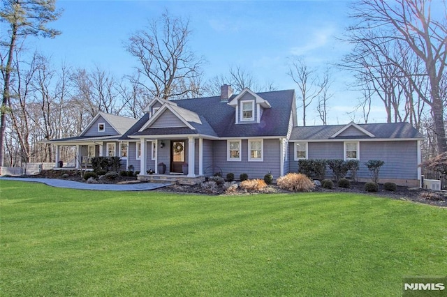 cape cod-style house featuring central AC, a porch, and a front lawn