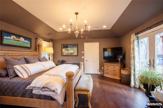 bedroom featuring a notable chandelier, french doors, vaulted ceiling, and dark hardwood / wood-style floors