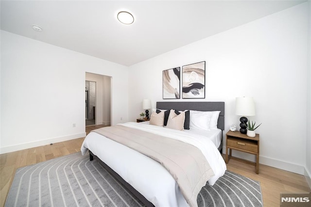 bedroom featuring wood-type flooring