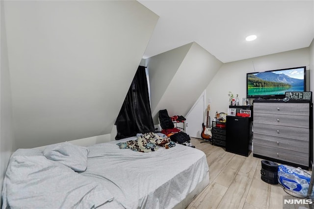 bedroom with light hardwood / wood-style flooring