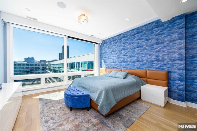 bedroom featuring hardwood / wood-style floors