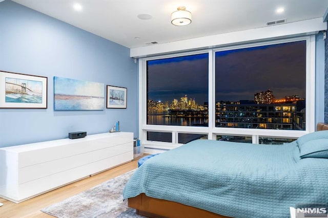 bedroom featuring hardwood / wood-style flooring