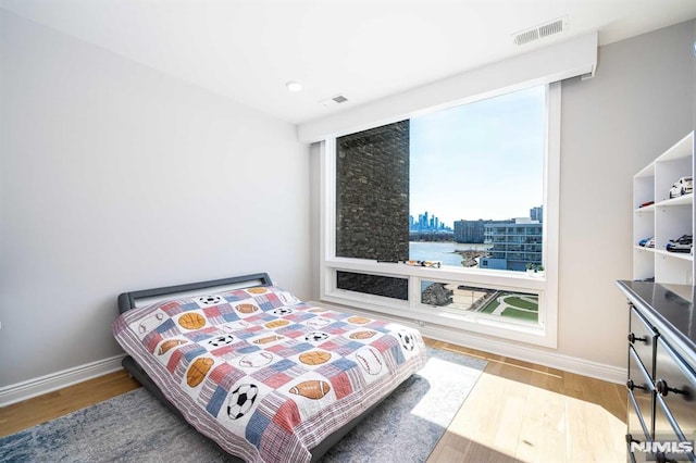 bedroom featuring hardwood / wood-style floors