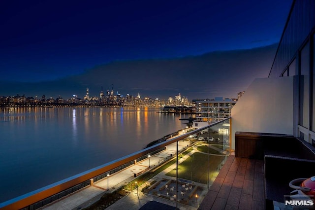 balcony at night with a water view