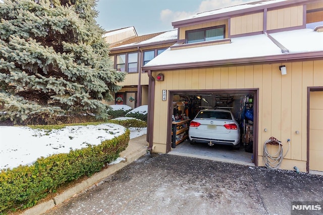 exterior space with a garage