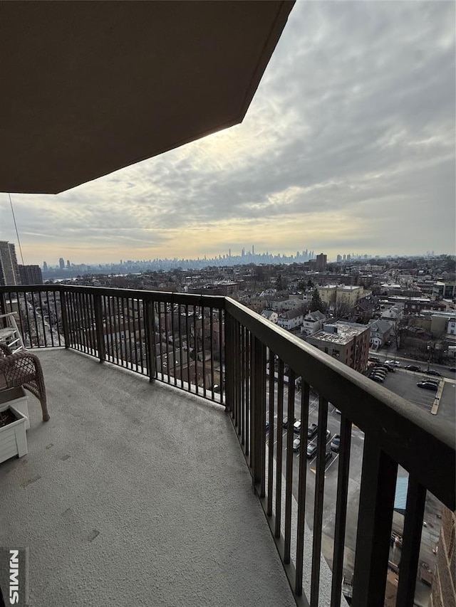 view of balcony at dusk