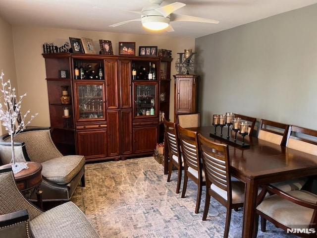 dining area featuring ceiling fan