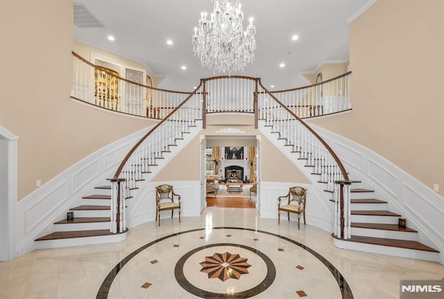 entrance foyer featuring an inviting chandelier