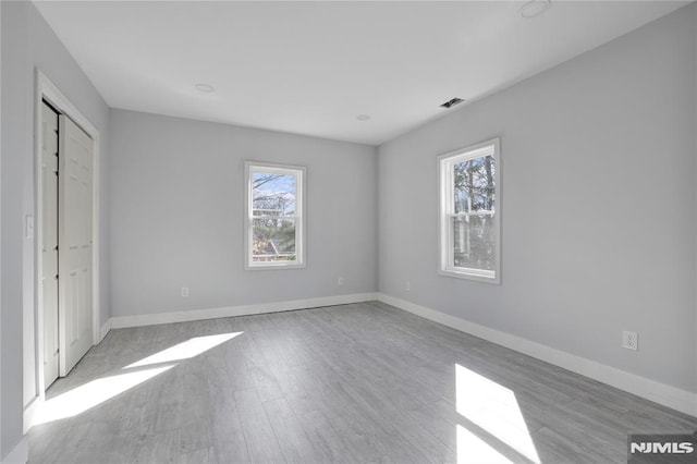 unfurnished bedroom featuring light hardwood / wood-style floors