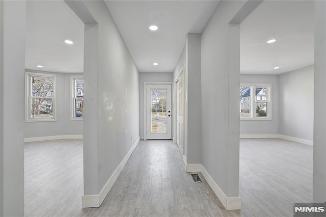 hall featuring light hardwood / wood-style floors