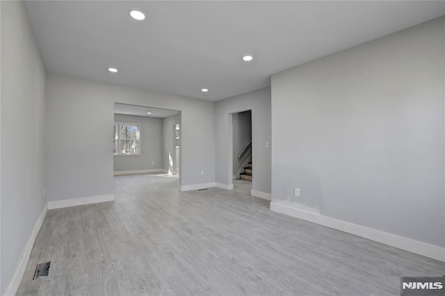 empty room with light wood-type flooring