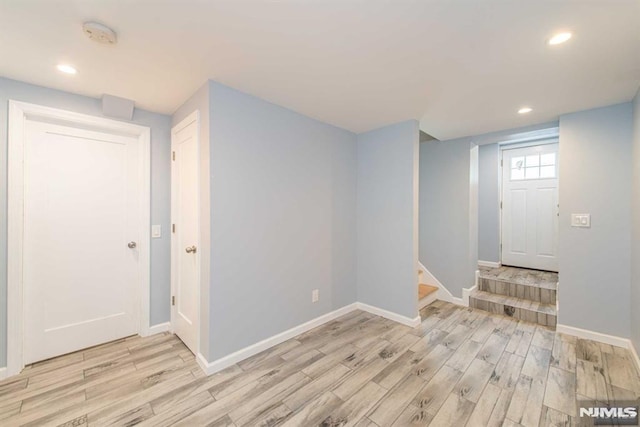 foyer entrance featuring light hardwood / wood-style flooring