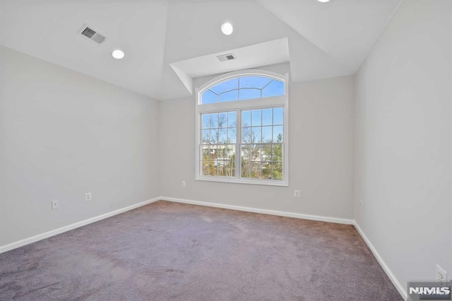 empty room featuring carpet flooring