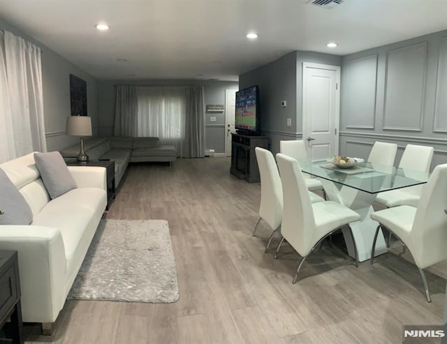 dining room featuring light wood-type flooring