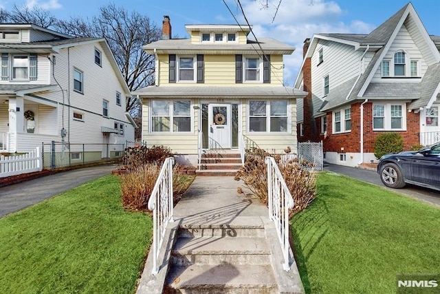 view of front of home with a front yard