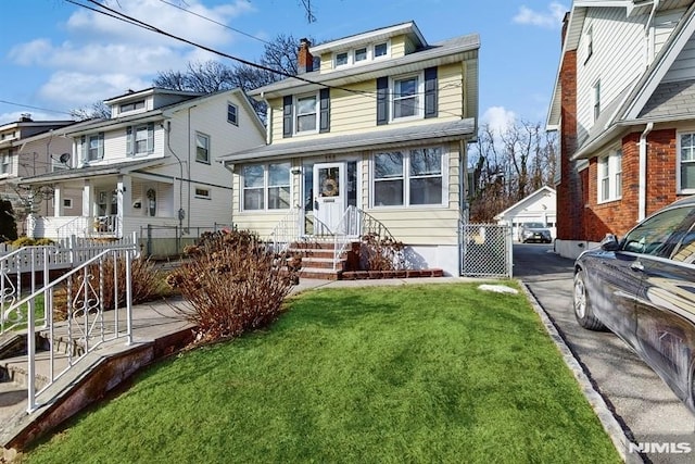 view of front of property with a front lawn