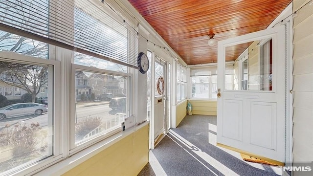 sunroom with wood ceiling