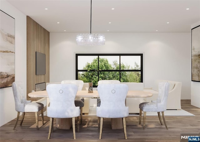 dining room with recessed lighting and wood finished floors