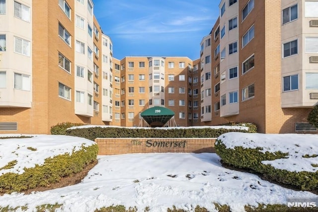 view of snow covered property