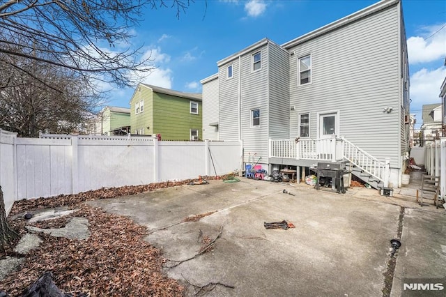 rear view of house with a patio area