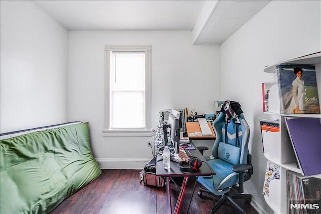 office space with dark hardwood / wood-style floors