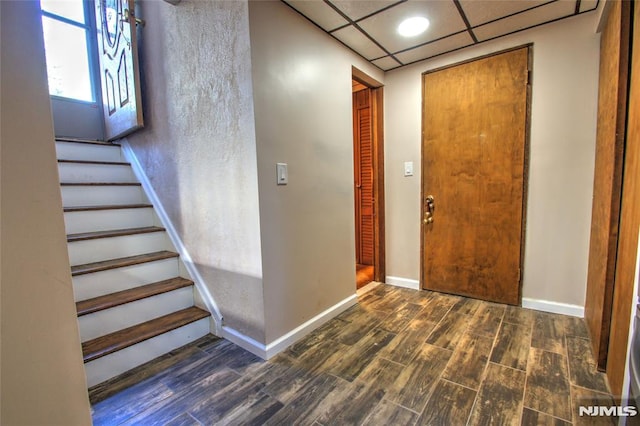 foyer entrance featuring a paneled ceiling