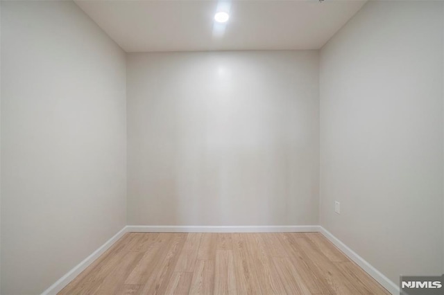 empty room with light wood-type flooring