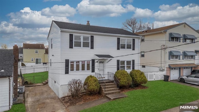 view of front of home with a front lawn