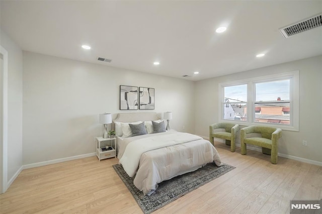 bedroom featuring light wood-type flooring