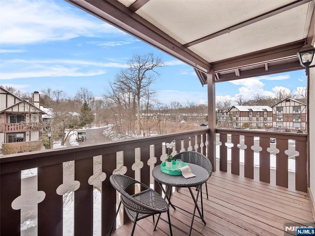 view of snow covered deck