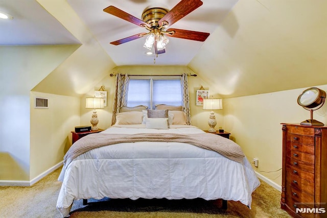 bedroom with lofted ceiling, carpet floors, and ceiling fan