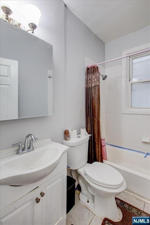 full bathroom featuring toilet, vanity, shower / bathtub combination with curtain, and tile patterned flooring