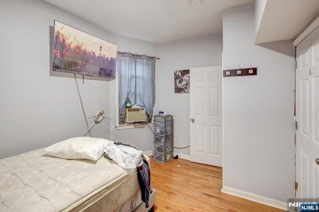 bedroom featuring light wood-type flooring