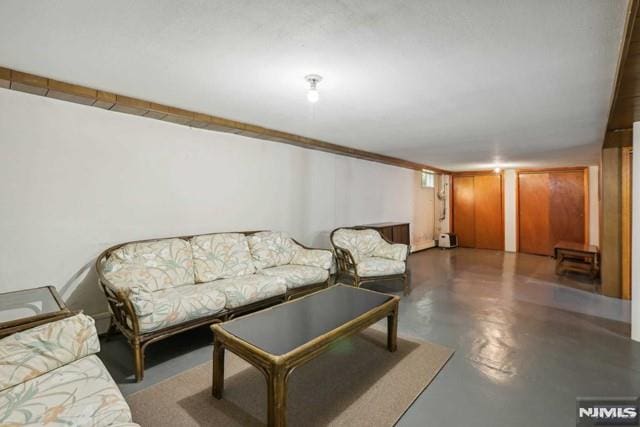 living room featuring concrete floors