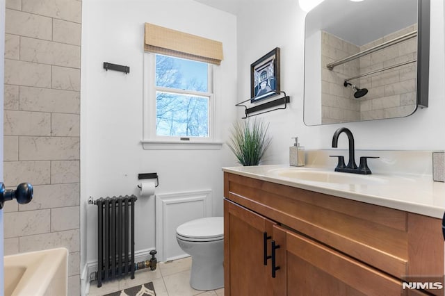 full bathroom featuring bathtub / shower combination, tile patterned flooring, toilet, radiator heating unit, and vanity