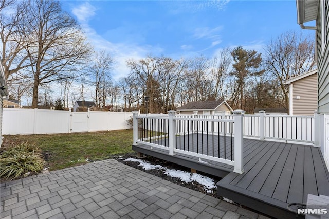 wooden deck with a yard