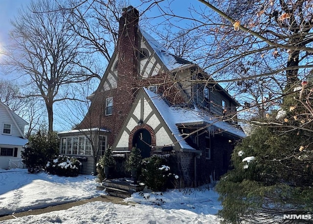 view of tudor-style house