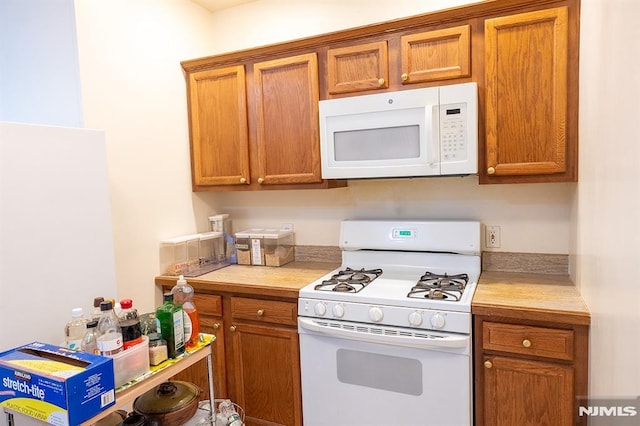 kitchen featuring white appliances