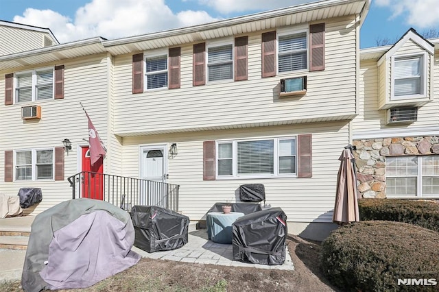 back of house featuring a patio area