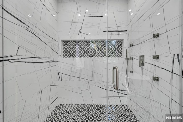 bathroom with an enclosed shower