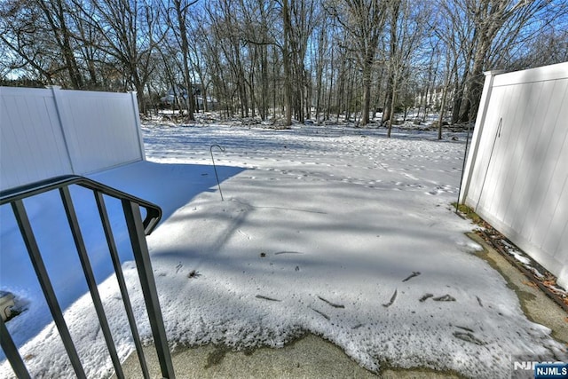 view of snowy yard