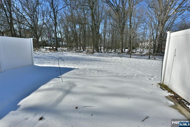 view of snowy yard