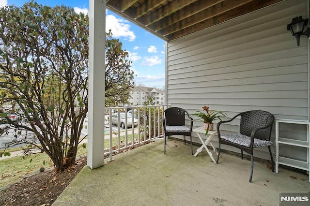 view of patio with a balcony