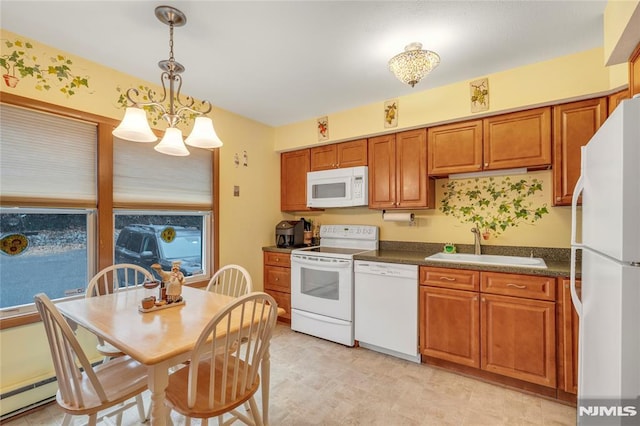 kitchen with a baseboard radiator, white appliances, sink, hanging light fixtures, and a notable chandelier